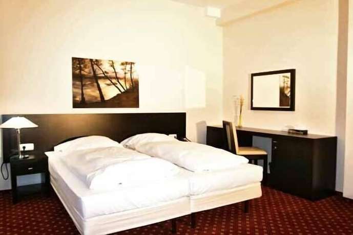 Imagen de la habitación del Hotel Aariana. Foto 9