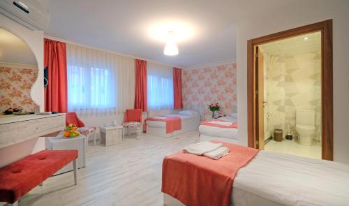 Imagen de la habitación del Hotel Abro Sezenler. Foto 6