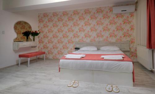 Imagen de la habitación del Hotel Abro Sezenler. Foto 7