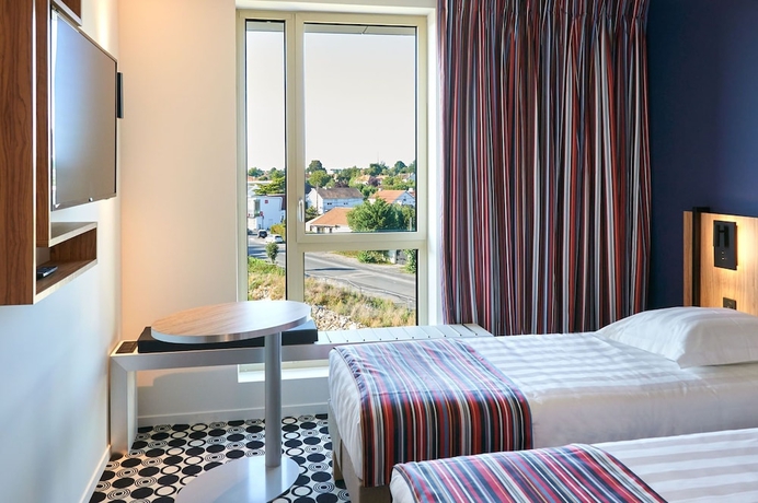 Imagen de la habitación del Hotel Akena Nantes Reze Aeroport - Neuf. Foto 4