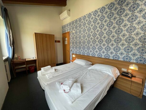 Imagen de la habitación del Hotel Al Castello. Foto 16