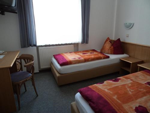 Imagen de la habitación del Hotel Albena - garni Hotel. Foto 5