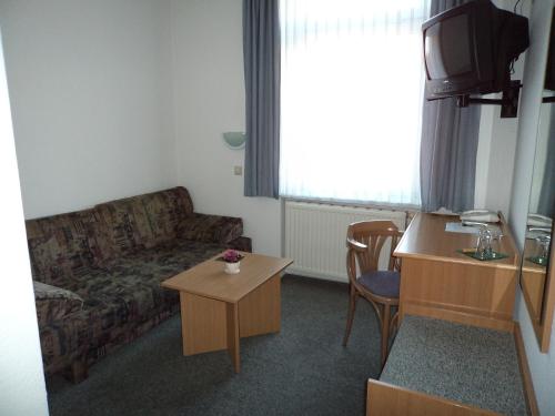 Imagen de la habitación del Hotel Albena - garni Hotel. Foto 7