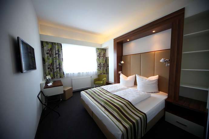 Imagen de la habitación del Hotel Alea City. Foto 13