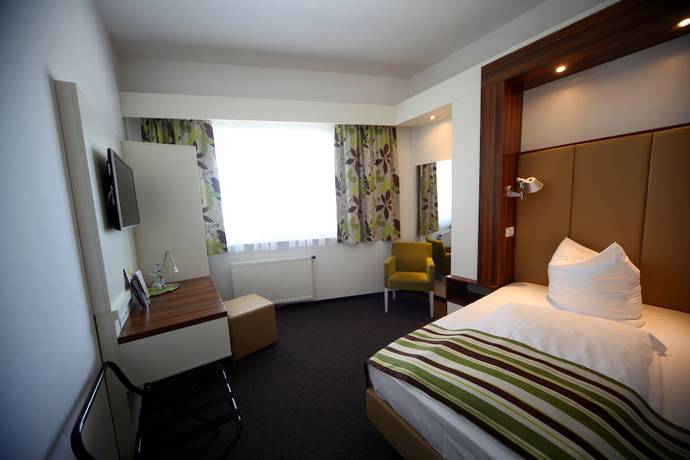 Imagen de la habitación del Hotel Alea City. Foto 15
