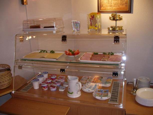 Imagen del bar/restaurante del Hotel Alfa, Neu Isenburg. Foto 2