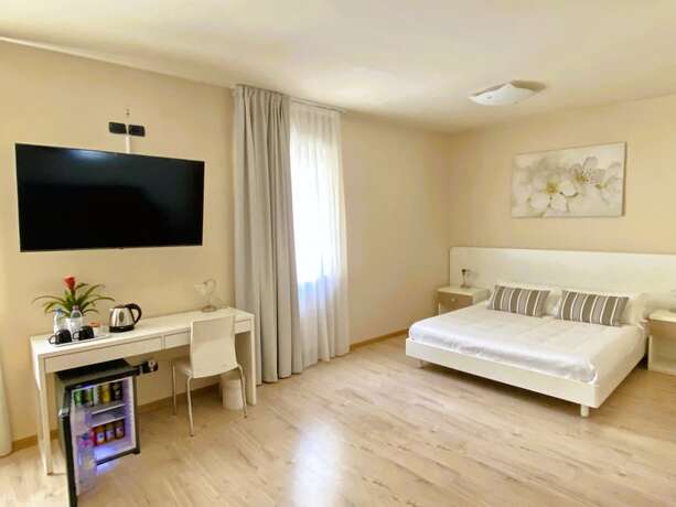 Imagen de la habitación del Hotel Alle Porte. Foto 14