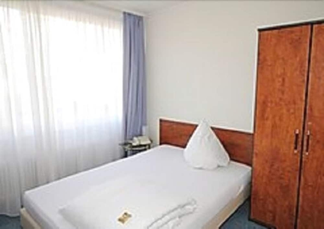 Imagen de la habitación del Hotel Alpha. Foto 8