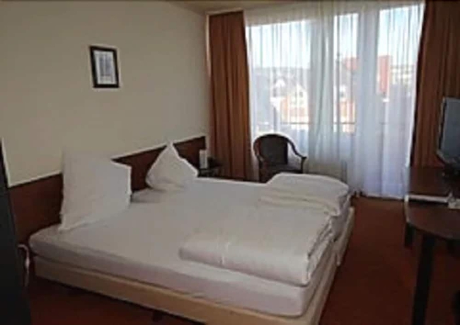 Imagen de la habitación del Hotel Alpha. Foto 10