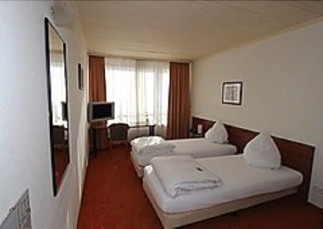 Imagen de la habitación del Hotel Alpha. Foto 11