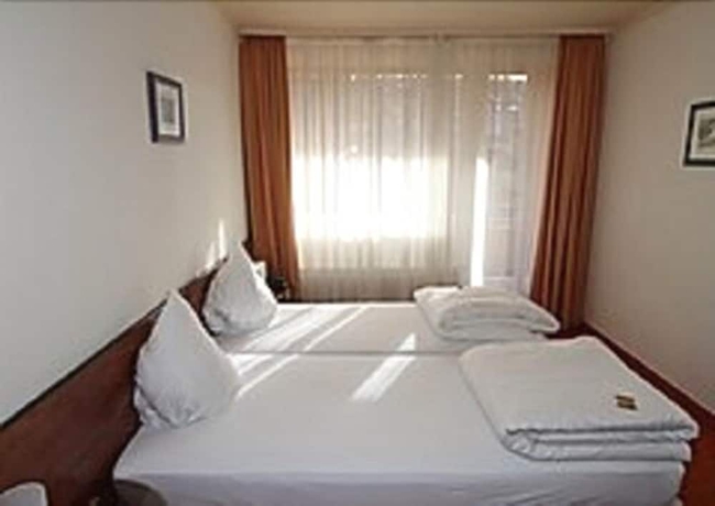 Imagen de la habitación del Hotel Alpha. Foto 12