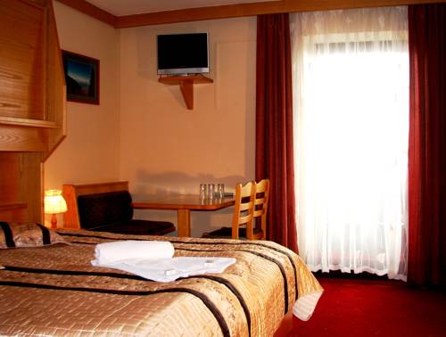 Imagen de la habitación del Hotel Alpinum. Foto 4