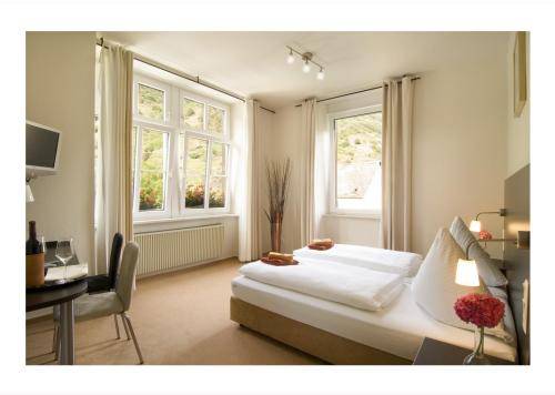 Imagen de la habitación del Hotel Altes Pfarrhaus, Bruttig-Fankel. Foto 11