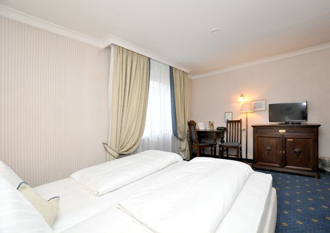 Imagen de la habitación del Hotel Altmünchen. Foto 17
