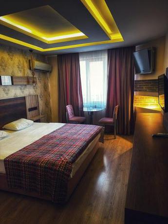 Imagen de la habitación del Hotel Altunhan. Foto 17