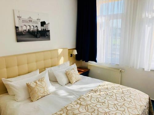 Imagen de la habitación del Hotel Am Bayrischen Platz. Foto 9