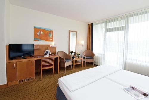 Imagen de la habitación del Hotel Am Kurpark. Foto 9