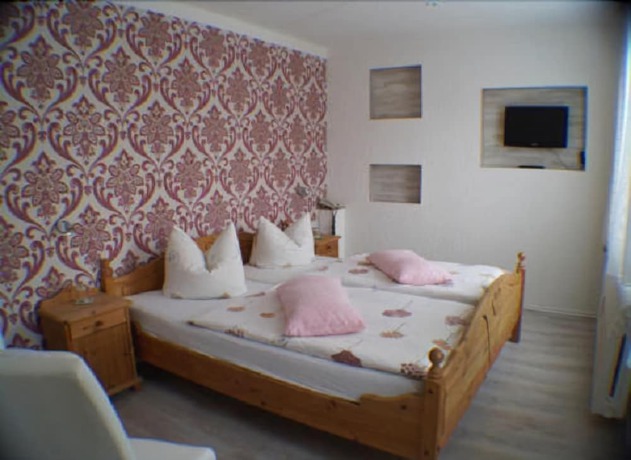 Imagen de la habitación del Hotel Am Kurpark. Foto 8