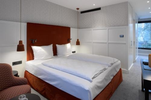 Imagen de la habitación del Hotel Am Ochsentor. Foto 9