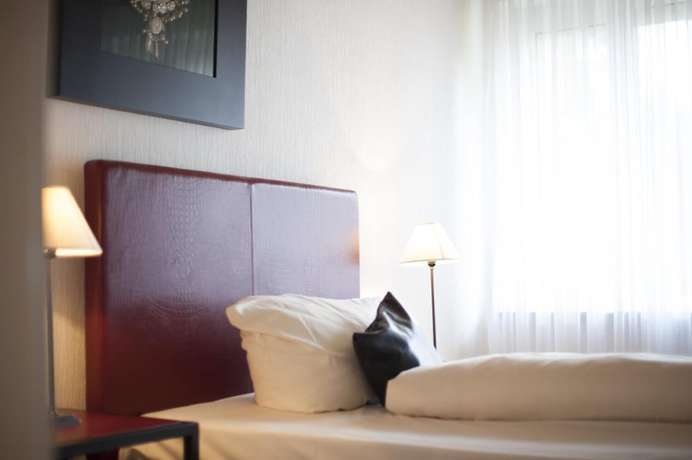 Imagen de la habitación del Hotel Am Park, Willich. Foto 10