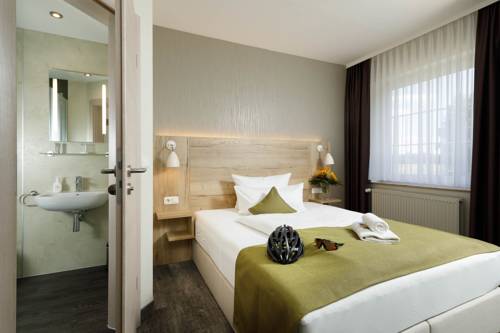Imagen de la habitación del Hotel Am Schlo&szlig;brunnen. Foto 4