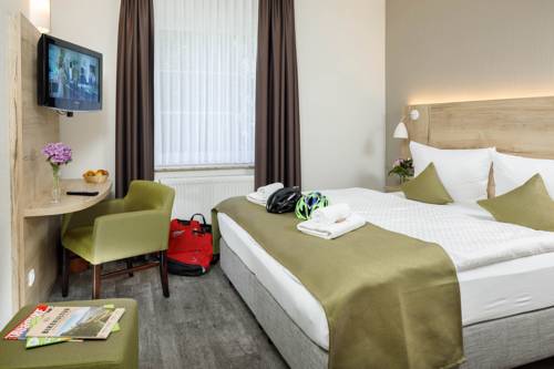 Imagen de la habitación del Hotel Am Schlo&szlig;brunnen. Foto 5