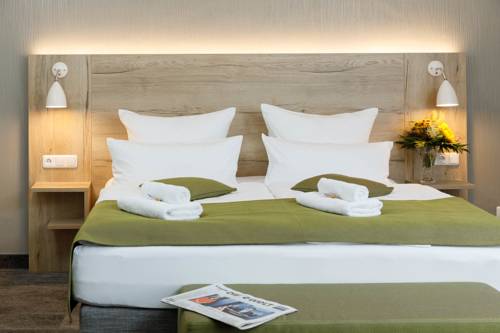 Imagen de la habitación del Hotel Am Schlo&szlig;brunnen. Foto 6