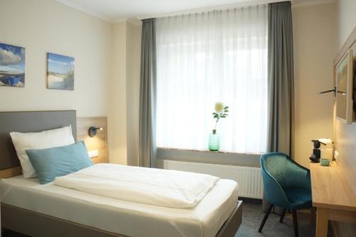 Imagen de la habitación del Hotel Am S&uuml;dw&auml;ldchen. Foto 7