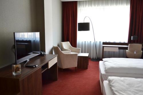 Imagen de la habitación del Hotel Arena, Trnava. Foto 8