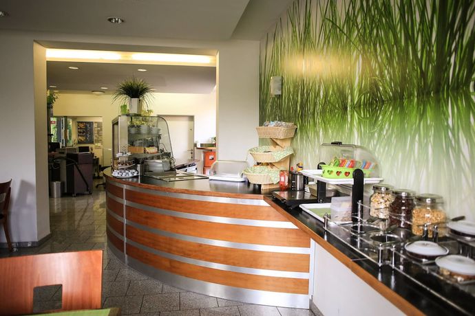 Imagen del bar/restaurante del Hotel Arina. Foto 4