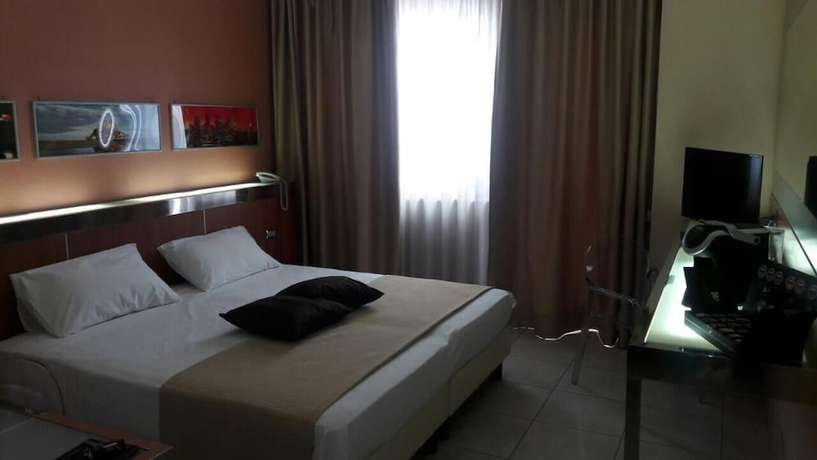 Imagen de la habitación del Hotel Artemide. Foto 5