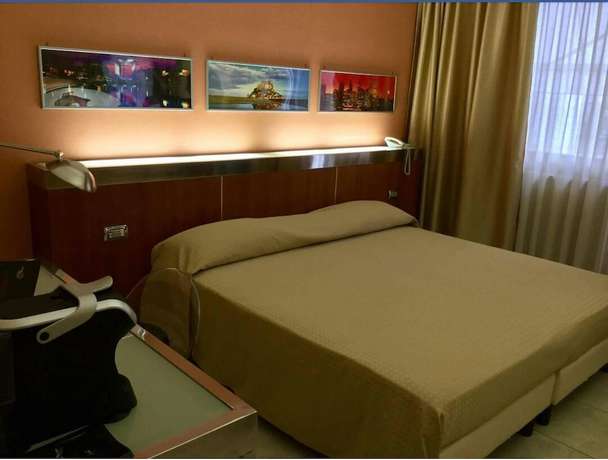 Imagen de la habitación del Hotel Artemide. Foto 6