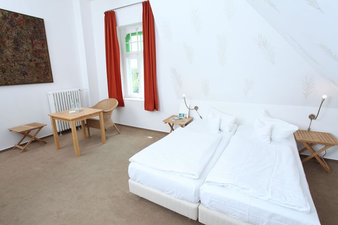 Imagen de la habitación del Hotel Artgenossen. Foto 5
