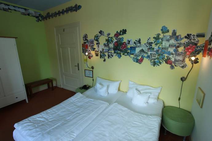 Imagen de la habitación del Hotel Artgenossen. Foto 8