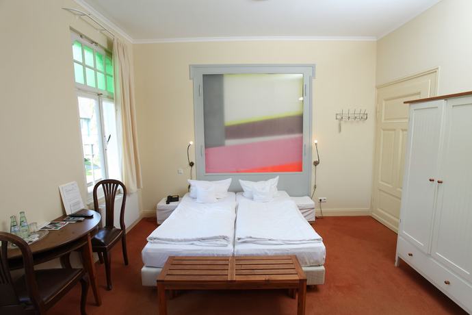 Imagen de la habitación del Hotel Artgenossen. Foto 14