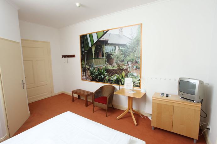 Imagen de la habitación del Hotel Artgenossen. Foto 16