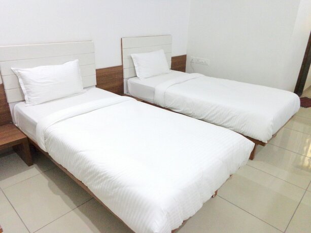 Imagen de la habitación del Hotel Ashray Inn Express. Foto 7