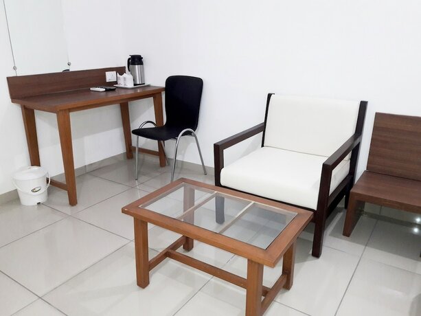 Imagen de la habitación del Hotel Ashray Inn Express. Foto 9