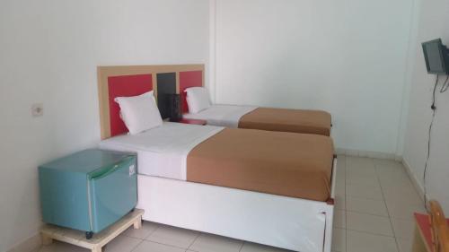 Imagen de la habitación del Hotel Asia Bukittinggi. Foto 14