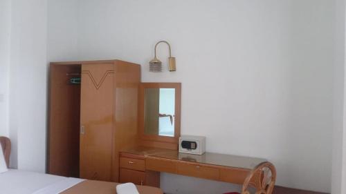 Imagen de la habitación del Hotel Asia Bukittinggi. Foto 17