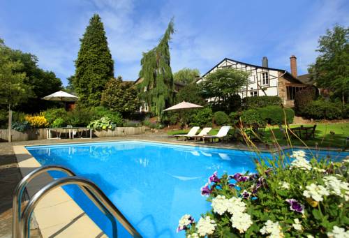 Imagen de la habitación del Hotel Aux Ecuries De La Reine. Foto 2