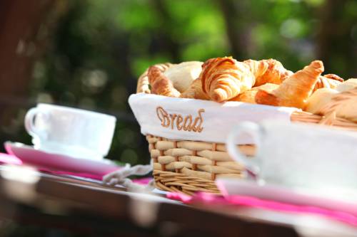 Imagen de la habitación del Hotel Aux Ecuries De La Reine. Foto 11