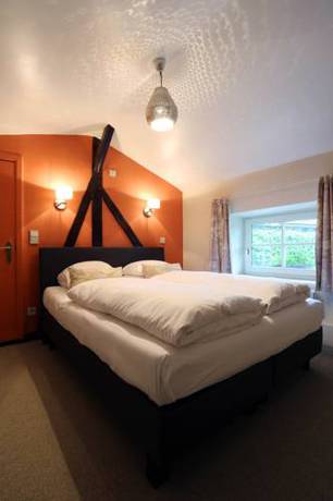 Imagen de la habitación del Hotel Aux Ecuries De La Reine. Foto 15