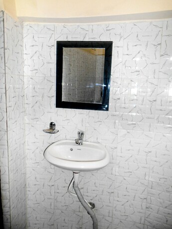 Imagen de la habitación del Hotel Awaas Corporate Inn. Foto 8