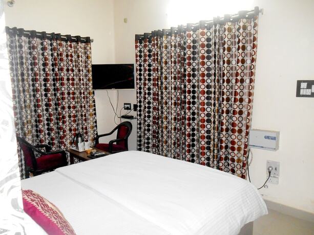 Imagen de la habitación del Hotel Awaas Corporate Inn. Foto 10