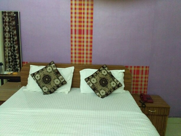 Imagen de la habitación del Hotel Awaas Corporate Inn. Foto 13
