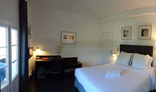 Imagen de la habitación del Hotel B Lodge. Foto 10