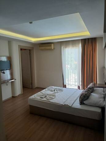 Imagen de la habitación del Hotel Barlas Fethiye. Foto 17
