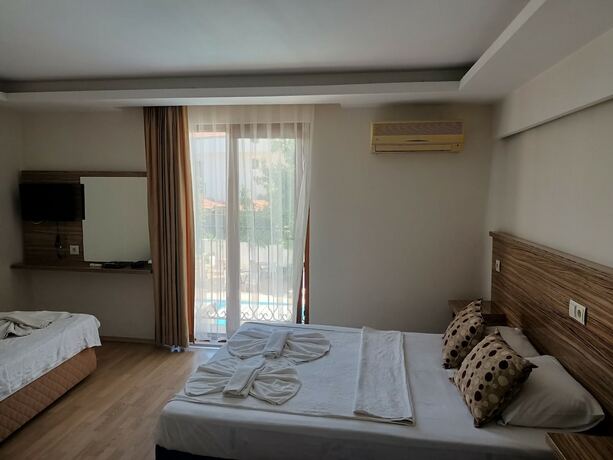 Imagen de la habitación del Hotel Barlas Fethiye. Foto 18