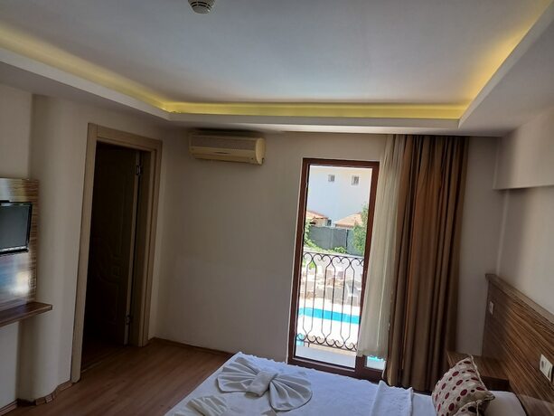 Imagen de la habitación del Hotel Barlas Fethiye. Foto 19